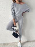 Casual Two-Piece Outfit Featuring A Long-Sleeve Pullover And High-Waisted Drawstring Pants